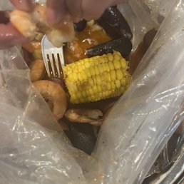 Shrimp and M8. Black Mussel with corn, potatoes, and sausage Shrimp and M8. Black Mussel with corn, potatoes, and sausage