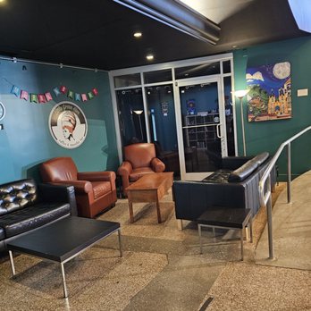 Little Green Hive - The leather sofas and seats area for the Little Green Hive customers. - Coffee & Tea Near Me - Roanoke, Virginia