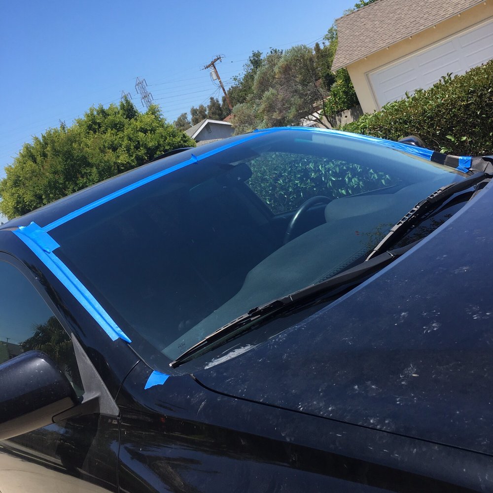 Sam's Auto Glass - Finished product- windshield replacement (temporarily taped to make sure it dries with a good seal). Lookin' good! - Auto Glass Services Near Me - Stanton, California Sam's Auto Glass - Finished product- windshield replacement (temporarily taped to make sure it dries with a good seal). Lookin' good! - Auto Glass Services Near Me - Stanton, California