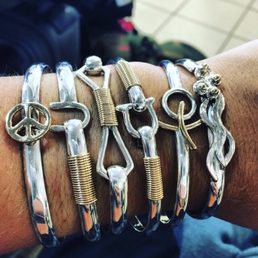 My fiances bracelets. Peace, hook, forgot the others. There are lots to choose from which help you find what is meaningful for you! My fiances bracelets. Peace, hook, forgot the others. There are lots to choose from which help you find what is meaningful for you!