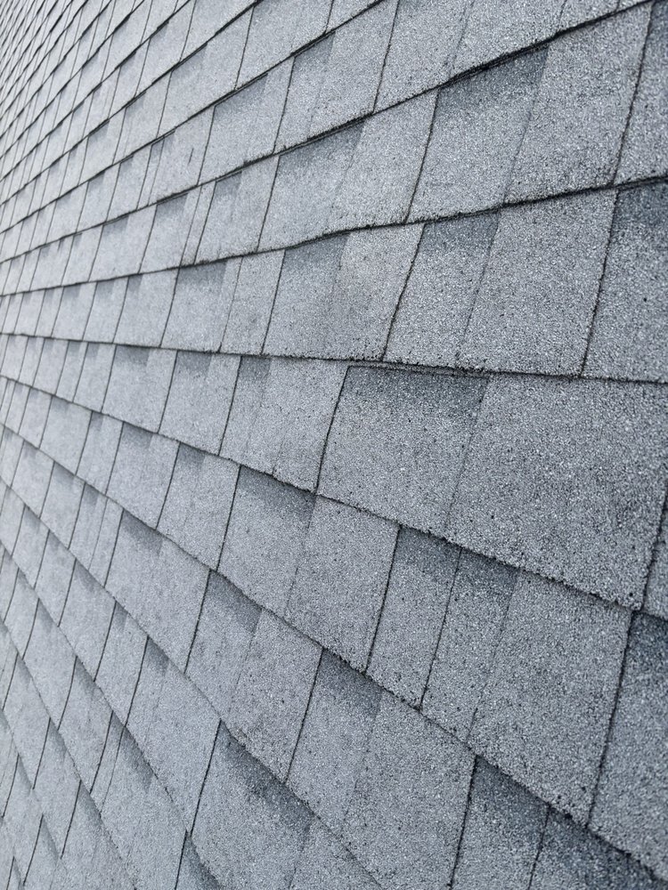 Slide of Safeguard Roofing Company