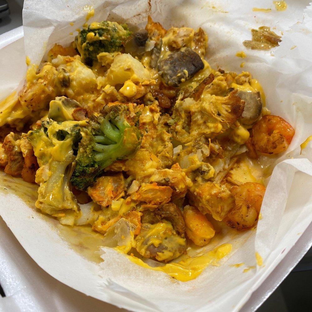 Loaded potato with chicken and shrimp Loaded potato with chicken and shrimp