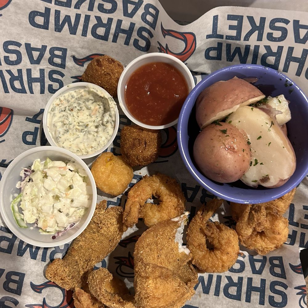 Shrimp Basket - Flounder Basket-Flounder basket with shrimp slaw, hushpuppies, corn fritter and new potatoes. - Seafood Near Me - Pensacola, Florida Shrimp Basket - Flounder Basket-Flounder basket with shrimp slaw, hushpuppies, corn fritter and new potatoes. - Seafood Near Me - Pensacola, Florida