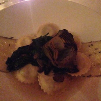 Sonsie - Mushroom ravioli with sauteed spinach, steamed artichoke, and truffle cheese. - New American Near Me - Boston, Massachusetts