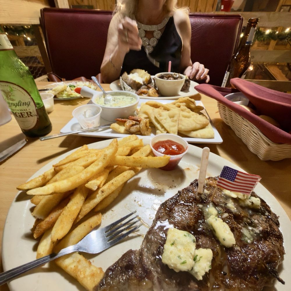 Marshall Steakhouse - 15oz USDA Prime Rib at Marshall Steakhouse - aged 28 days - cooked medium rare with Maitre D Butter - Steakhouses Near Me - Holly Springs, Mississippi