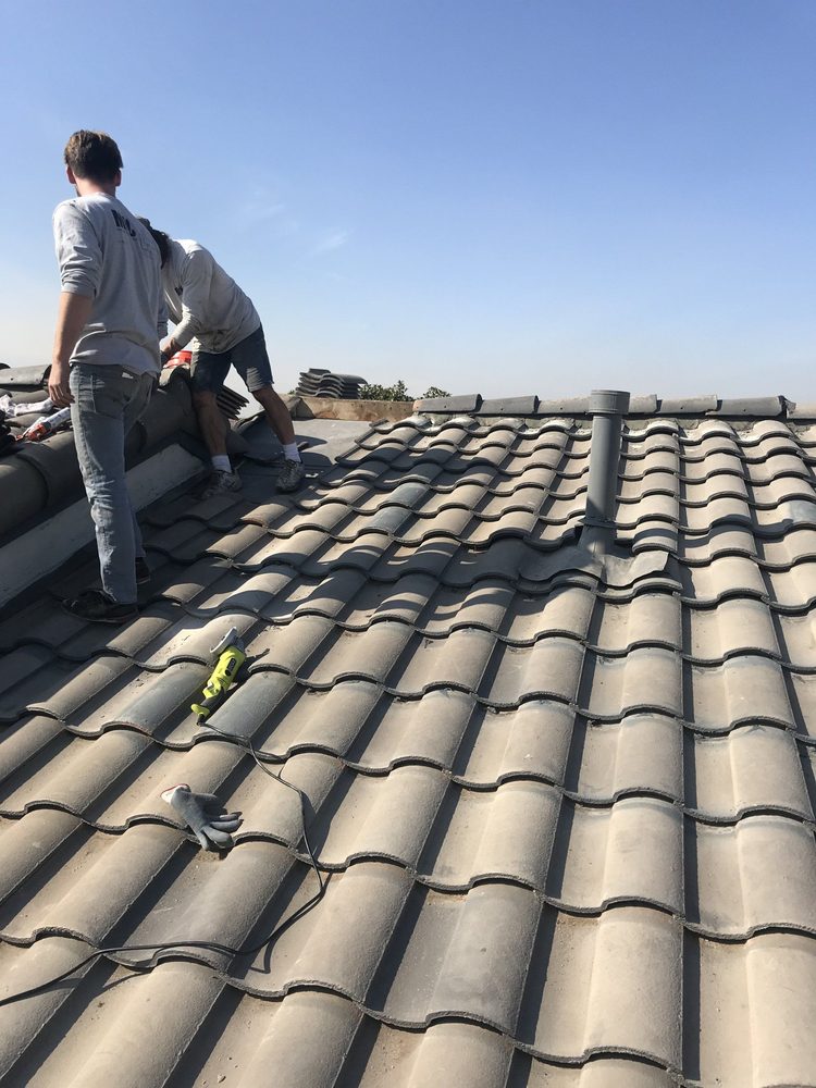 Slide of Clonts Roofing