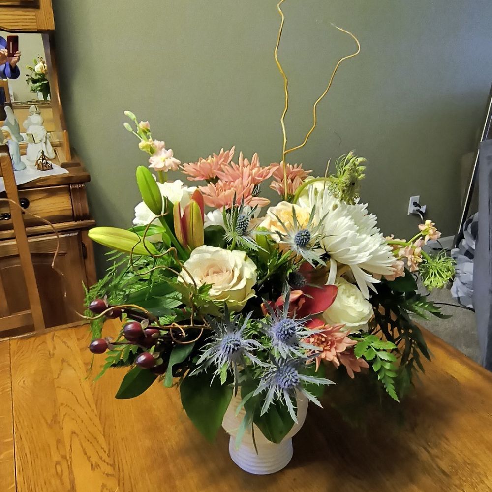 Floral arrangement delivered by Farmhouse Box and Bloom. Floral arrangement delivered by Farmhouse Box and Bloom.