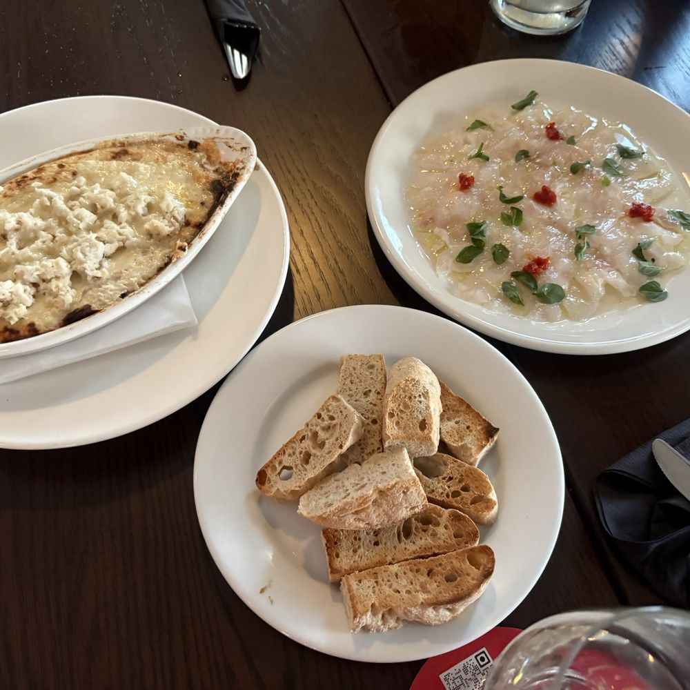 Smuggler's Cove - Top left: crap dip Top right: sea bass crudo - Seafood Near Me - Greenport, New York Smuggler's Cove - Top left: crap dip Top right: sea bass crudo - Seafood Near Me - Greenport, New York