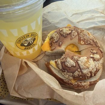 Einstein Bros. Bagels - Asiago bagel with egg and cheese and a passion fruit sunrise refresher - Breakfast & Brunch Near Me - Hebron, Kentucky