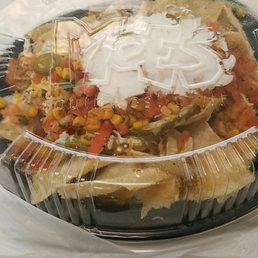My fave.... nacho bowl topped with chicken, rice, salad, corn, salsa, queso, pickled jalapenos and door cream. My fave.... nacho bowl topped with chicken, rice, salad, corn, salsa, queso, pickled jalapenos and door cream.