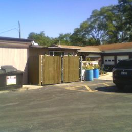 View of the outside dining area and kitchen from the south parking lot.
