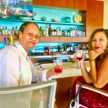 Nā Lei Aloha - Me & my Aunty at Swim Bar for a cocktail before the show--NA Lei Aloha Luau - Performing Arts Near Me - Honolulu, Hawaii Nā Lei Aloha - Me & my Aunty at Swim Bar for a cocktail before the show--NA Lei Aloha Luau - Performing Arts Near Me - Honolulu, Hawaii