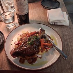 Alto Kitchen & Bar - Lamb shank over polenta with gravy. The lamb fell off the bone  It was a large portion.