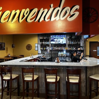 Viva Mexico Mexican Cuisine - a woman sitting at a bar - Mexican Near Me - Lexington, Kentucky Viva Mexico Mexican Cuisine - a woman sitting at a bar - Mexican Near Me - Lexington, Kentucky