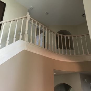 Dramatic Difference - Railing before Ryan worked his magic - Refinishing Services Near Me