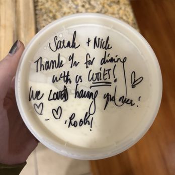 Roots Indian Bistro - We were sent home with a complimentary rice pudding with a sweet note. - Indian Near Me - Los Angeles, California