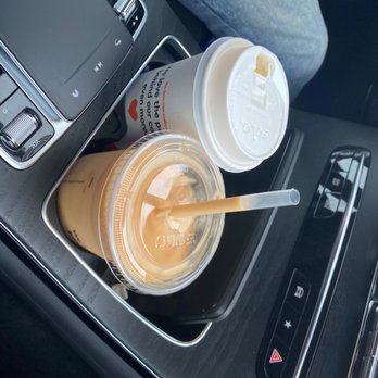 BIGGBY COFFEE - a cup of coffee in a cup holder - Coffee & Tea Near Me - Lansing, Michigan BIGGBY COFFEE - a cup of coffee in a cup holder - Coffee & Tea Near Me - Lansing, Michigan