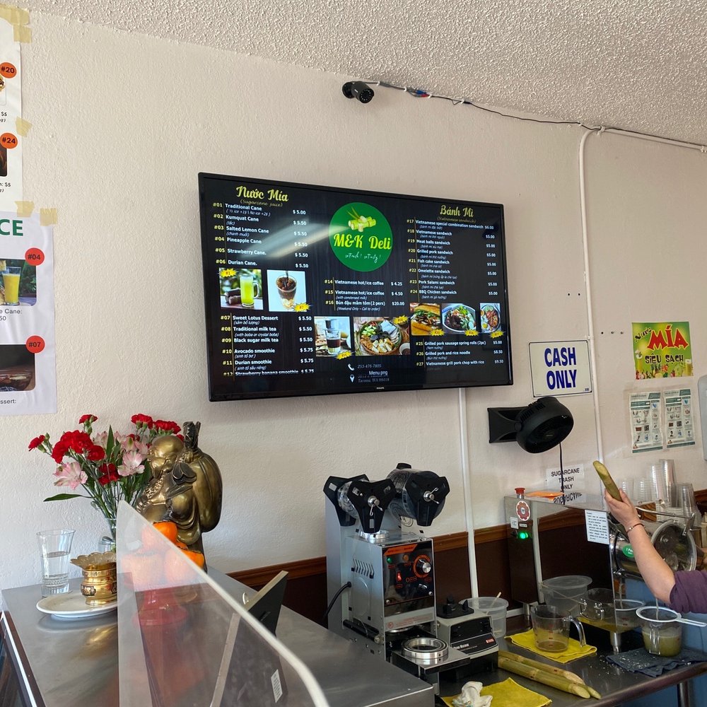 M & K Bakery - a woman ordering food - Delis Near Me - Tacoma, Washington M & K Bakery - a woman ordering food - Delis Near Me - Tacoma, Washington