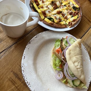 Off The Grid - Falafel sandwich, breakfast pizza with veggie sausage and a latte with almond milk. - Breakfast & Brunch Near Me - Sperryville, Virginia
