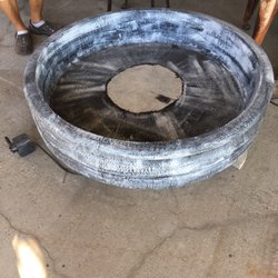 JRC Concrete Products - They will paint most anything they sell. I prefer the natural cement look myself.