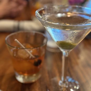 Plank Craft Kitchen & Bar - Tito Dirty Martini with stuffed blue cheese olive and a old fashion - American Near Me - Folsom, California Plank Craft Kitchen & Bar - Tito Dirty Martini with stuffed blue cheese olive and a old fashion - American Near Me - Folsom, California