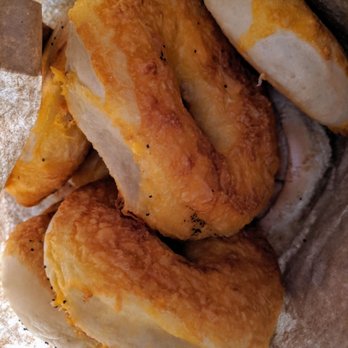 St. Urbain Bagel Bakery - I got six cheddar and six sesame bagels. There's one sesame bagel peeking out on the right. The cheddar is worth shelling out $0.25 more. - Bagels Near Me - Thornhill, Ontario St. Urbain Bagel Bakery - I got six cheddar and six sesame bagels. There's one sesame bagel peeking out on the right. The cheddar is worth shelling out $0.25 more. - Bagels Near Me - Thornhill, Ontario