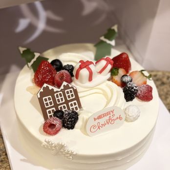 Paris Baguette - a white cake with berries and a chocolate house - Bakeries Near Me - Fullerton, California Paris Baguette - a white cake with berries and a chocolate house - Bakeries Near Me - Fullerton, California