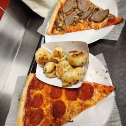Pepperoni and Sausage slice with Garlic knots