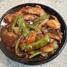 a bowl of stir fried vegetables