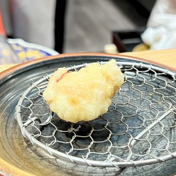 Okeya Kyujiro - a fried item on a plate - Sushi Bars Near Me - Montreal, Quebec