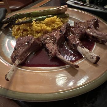Gypsy Cafe - Australian Lamb With saffron rice and asparagus - New American Near Me - Lincoln, New Hampshire
