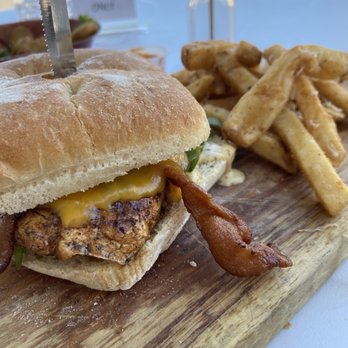 Pub Americana - Blackened Americana chicken sandwich - Bars Near Me - Cocoa, Florida Pub Americana - Blackened Americana chicken sandwich - Bars Near Me - Cocoa, Florida