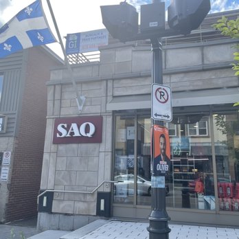 Saq - a street corner with a storefront and a traffic light - Beer, Wine & Spirits Near Me - Quebec City, Quebec Saq - a street corner with a storefront and a traffic light - Beer, Wine & Spirits Near Me - Quebec City, Quebec