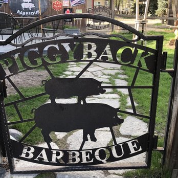 Piggyback BBQ - Loved the little gates going into courtyard area.Looks like they have a small stage for outdoor singers to perform. - Barbeque Near Me - Whitefish, Montana