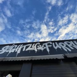 Slightly Furry - Front of the establishment.
