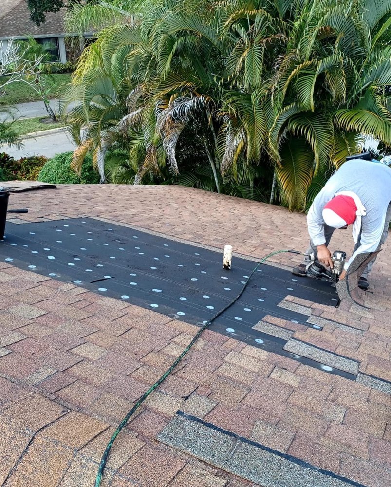 Slide of Guaranteed Roofing Solutions