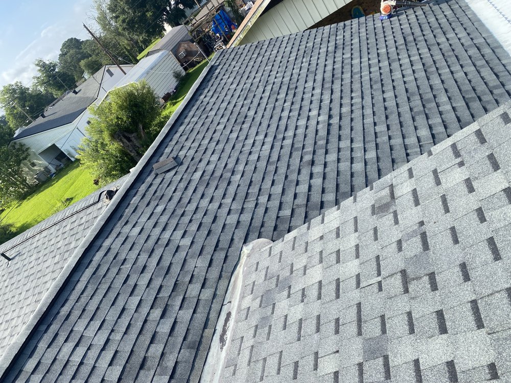 Slide of Vincents Roofing