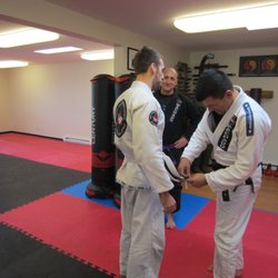 Jean Jacques Machado Jiu Jitsu Victoria - A new stripe for Gareth. Jean Jacques Machado Jiu Jitsu Victoria is the only affiliate school in Western Canada under Jean Jacques Machado.