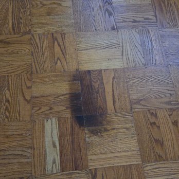 Polo Hardwood Floors - Moisture damaged dark spot - Flooring Near Me - Oakland, California Polo Hardwood Floors - Moisture damaged dark spot - Flooring Near Me - Oakland, California