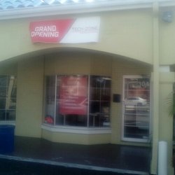 Tech-Zone - Front Store w/ Grand Opening Sign