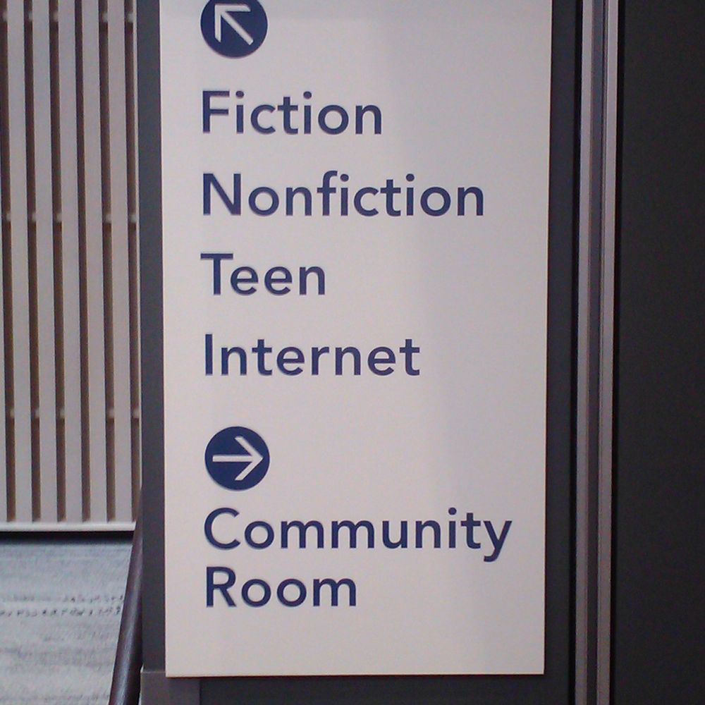 Oregon City Public Library - This is the signage at the base of the main staircase in the atrium, which is where you get your bearings. - Libraries Near Me - Oregon City, Oregon Oregon City Public Library - This is the signage at the base of the main staircase in the atrium, which is where you get your bearings. - Libraries Near Me - Oregon City, Oregon