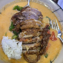 I am back and loved the Red Curry crispy duck . It was tender and the flavors were amazing .
