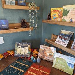 a display of books and stuffed animals