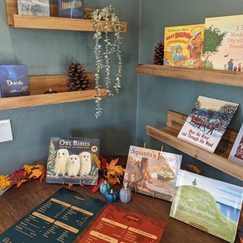 Renegade Coffee - a display of books and stuffed animals - Coffee & Tea Near Me - Kansas City, Missouri