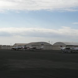 Lodi Airport - Aircraft share parking with autos.