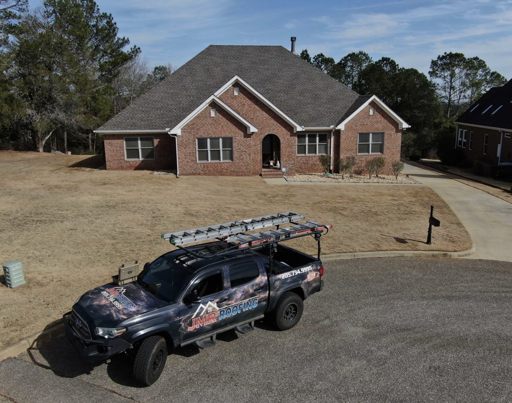 Slide of JMR Roofing