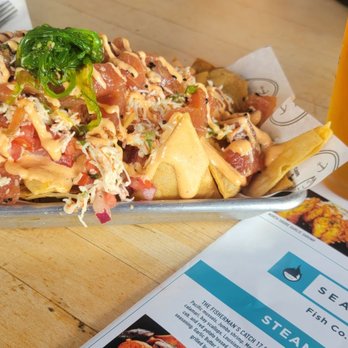Seasurf Fish - Spicy poke nachos and clams in einr sauce - Seafood Near Me - San Clemente, California Seasurf Fish - Spicy poke nachos and clams in einr sauce - Seafood Near Me - San Clemente, California