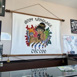 Body Language Tattoo & Piercing Studio - The sign in the front room!
