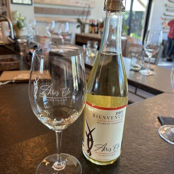 Airis'Ele Vineyards - a glass of wine and a bottle of wine - Wineries Near Me - Fredericksburg, Texas Airis'Ele Vineyards - a glass of wine and a bottle of wine - Wineries Near Me - Fredericksburg, Texas