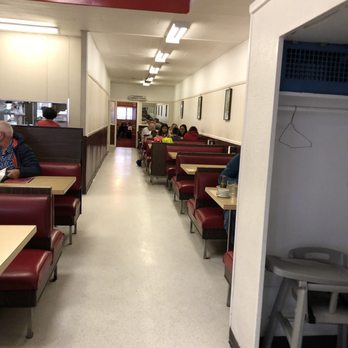 West End Restaurant - diners sitting at long tables - Imported Food Near Me - Prince Rupert, British Columbia West End Restaurant - diners sitting at long tables - Imported Food Near Me - Prince Rupert, British Columbia
